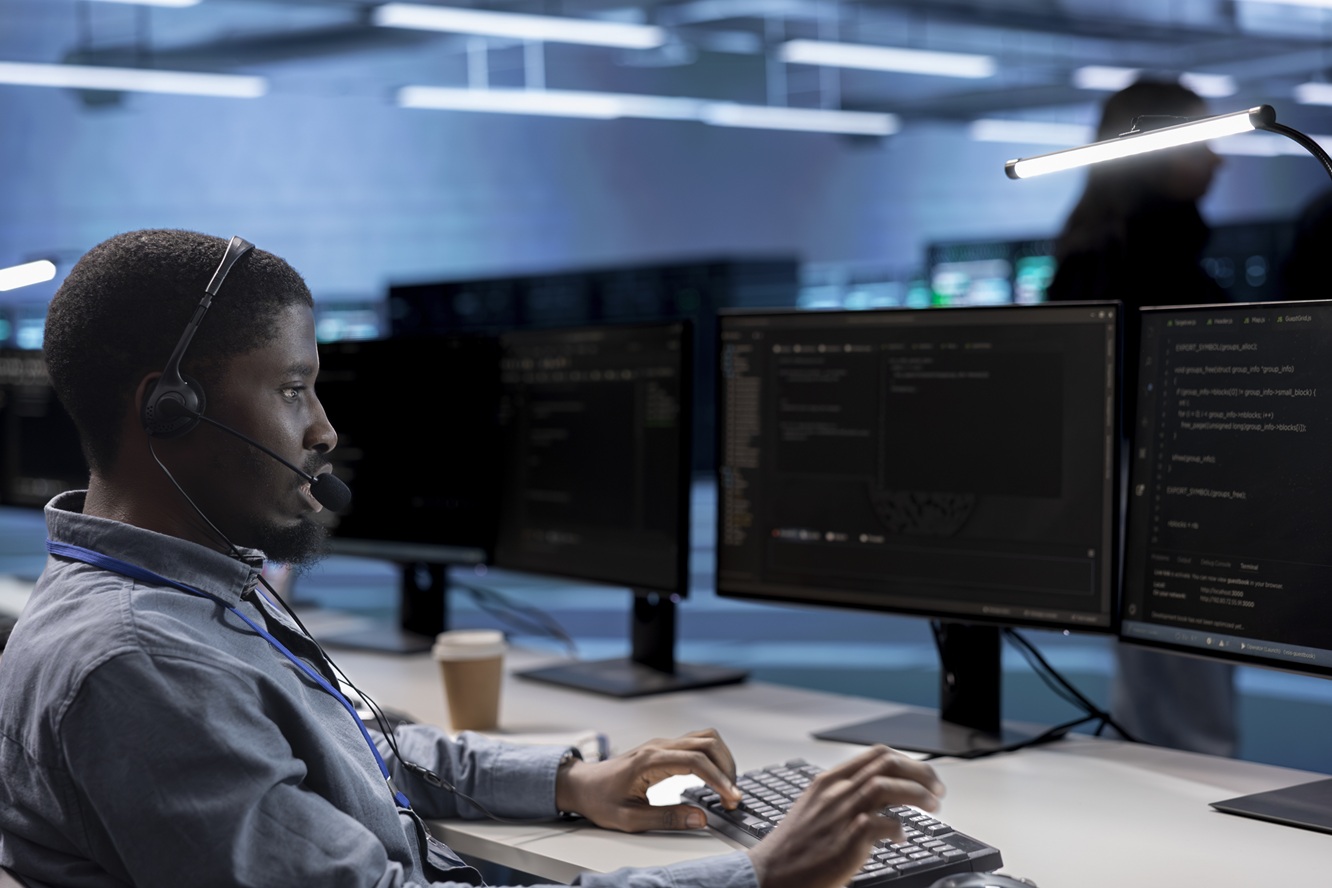 American IT support team monitoring network systems